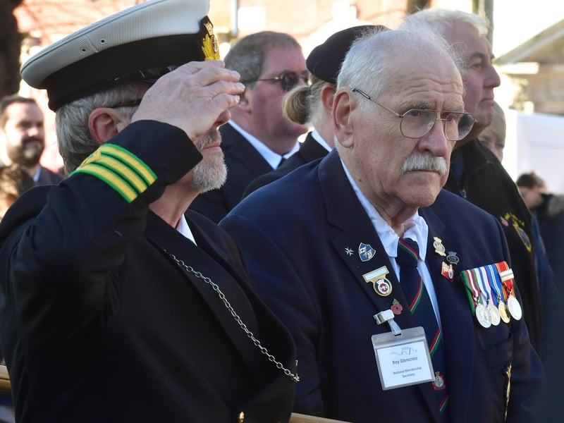 Paying their respects.