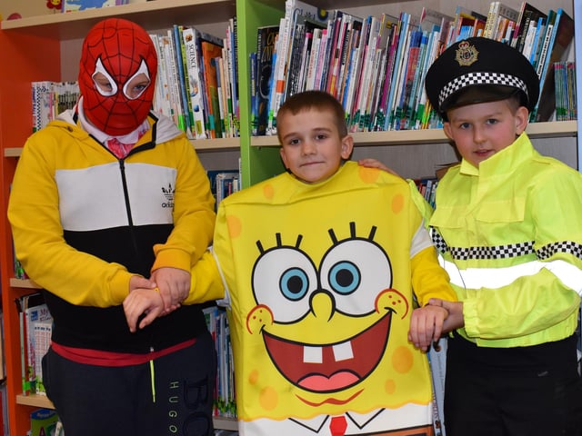 Children dressed as colourful characters for World Book Day.