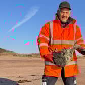 Derrick Whitworth from ELDC  Street Scene on Skegness beach viewing the debris.