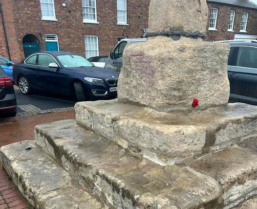 Poppies removed from the Buttercross in Wainfleet.