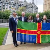 The Speaker of the House of Commons, Sir Lindsay Hoyle, joined Lincolnshire MPs Hamish Falconer, Sir Edward Leigh, Victoria Atkins, Dr Caroline Johnson, John Hayes and Richard Tice, in New Palace Yard to mark Lincolnshire Day 2026, alongside the county flag.