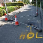 The sinkhole in Middlegate Road West, Frampton, near Boston.