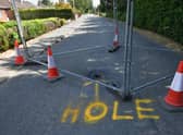 The sinkhole in Middlegate Road West, Frampton, near Boston.