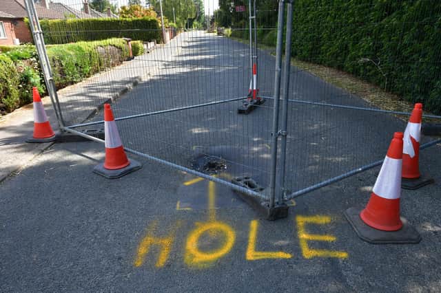The sinkhole in Middlegate Road West, Frampton, near Boston.