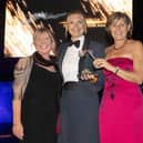The community support team receive their award at RAF Coningsby's CAFTAS from Air Commodore Claire O'Grady. (PHOTO BY: Sgt Nicholas Egan/RAF)