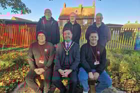Deputy Mayor of Skegness Coun Jimmy Brookes (front centre) checks out the new Bro Pro UK bench in St Clenent's Churchyard in Skegness.