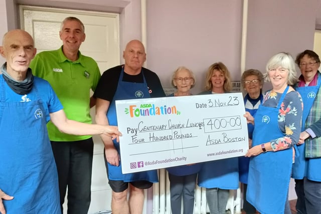 Asda's Stephen Bromby with Centenary Church volunteers.