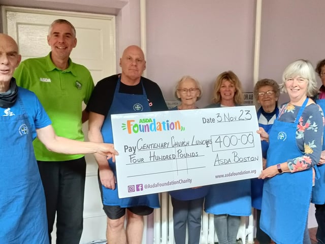 Asda's Stephen Bromby with Centenary Church volunteers.