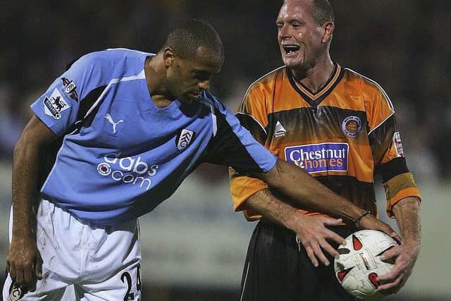 Paul Gascoigne of Boston tries to keep the ball from Alain Goma of Fulham during the Carling Cup second round match between Boston United and Fulham on September 22, 2004 at York Street, Boston. (Photo by Jamie McDonald/Getty Images)