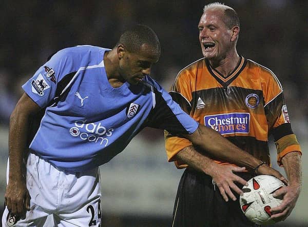 Paul Gascoigne of Boston tries to keep the ball from Alain Goma of Fulham during the Carling Cup second round match between Boston United and Fulham on September 22, 2004 at York Street, Boston. (Photo by Jamie McDonald/Getty Images)