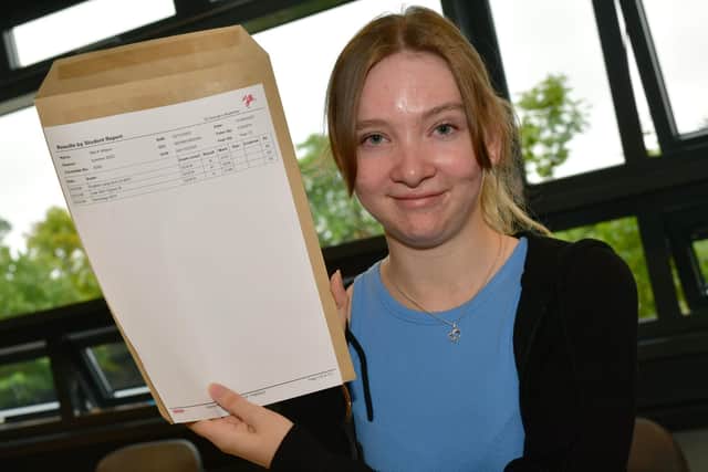 Mia Wilson, 18, with her results at St George's Academy.