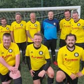 Members of Boston's Man Versus Fat football team.