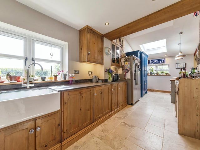 Around the corner to the kitchen section of the open-plan area.