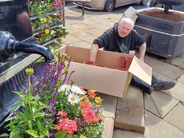 There was a job for everyone: Neil sorted the pots ready to be reused