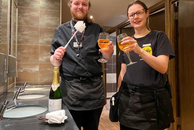 Ashley Thurston and Kerian Wood from The Joseph Morton pub toast the pub's success in this year's Loo of The Year Awards. Photo: Chris Frear