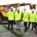 Lincoln Cathedral Assistant Clerk of Works Michael Graves; Lincoln Cathedral Director of Estates & Facilities Mark Wheater; Gelder Group CEO Steve Gelder cutting the first sod; Member of the Property Asset Committee (Cathedral) Giles Walter and Gelder Site Manager Alan Smith mark the start of work on the new stone-cutting centre