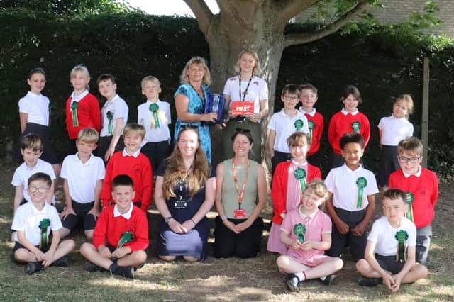 Year 3 pupils with staff at Kirkby La Thorpe Primary Academy after their Schools Challenge win. Photo: T & J Solly