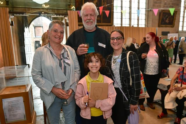 Gerry Ladds, Arthur Davey, Katie Epton and Lydia Epton, aged nine, of Willoughby Road Allotments.