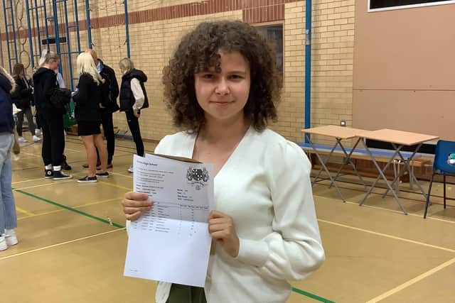 Another of the high school's pupils collecting their GCSE results today.