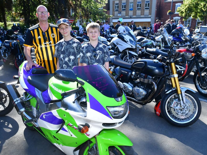 Andrew Bradley (left) with George Bradley, 12, and Henry Bradley, 10, of Boston.