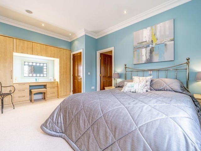One of the four double-bedrooms.