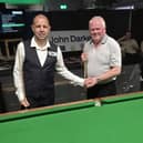 Secretary of the Louth Snooker League Jack Westerby gets ready to play Barry Hawkins.