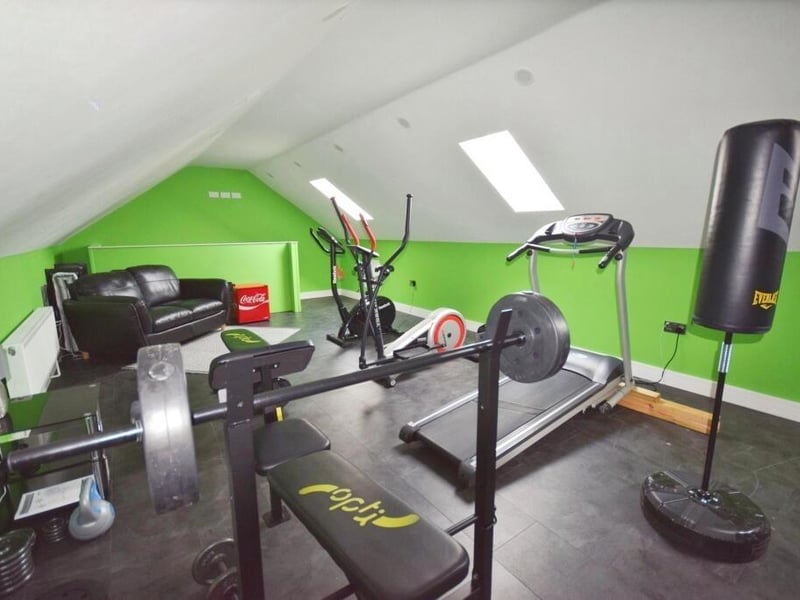 The home gym above the double garage.