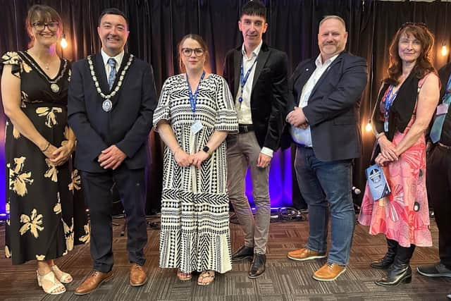Senior staff celebrating with the Mayor of Skegness Coun Jimmy Brookes,