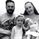 Little Dottie Harrison who sadly died just days before her first birthday pictured with her family.