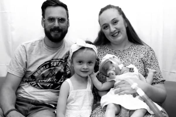 Little Dottie Harrison who sadly died just days before her first birthday pictured with her family.