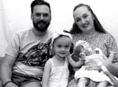 Little Dottie Harrison who sadly died just days before her first birthday pictured with her family.