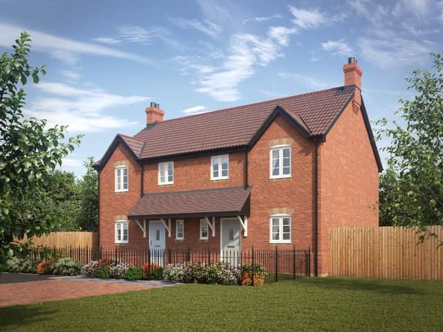 An artist's impression of one of the homes being built.