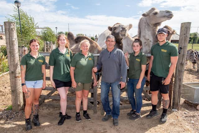 Wolds Wildlife Park owners Tracy Walters and Andrew Riddel (centre) with staff.