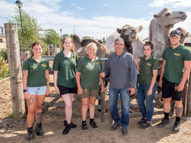 Wolds Wildlife Park owners Tracy Walters and Andrew Riddel (centre) with staff.