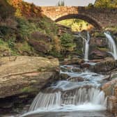 Three Shires Head. A waterfall and packhorse stone bridge at Three Shires Head in the Peak District National Park.