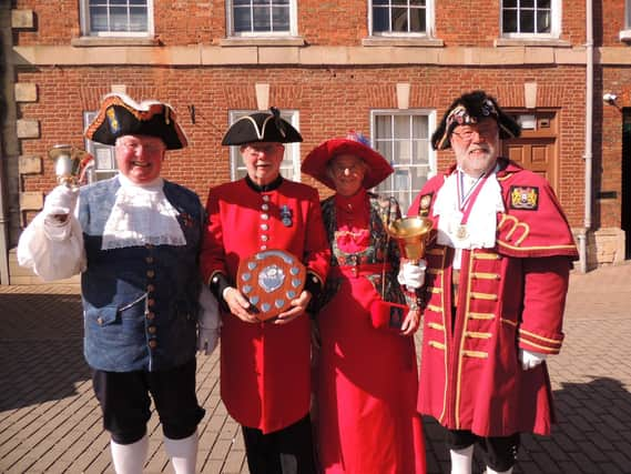 The winners. From left - Mike Wabe (3rd), Roy Palmer (1st), his consort Sandra Kettlewell, and Steven Holt (2nd).