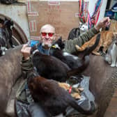 Ian Catmando of Gainsborough, Lincolnshire, at his home he shares with 70 cats. Tom Maddick / SWNS