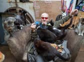Ian Catmando of Gainsborough, Lincolnshire, at his home he shares with 70 cats. Tom Maddick / SWNS