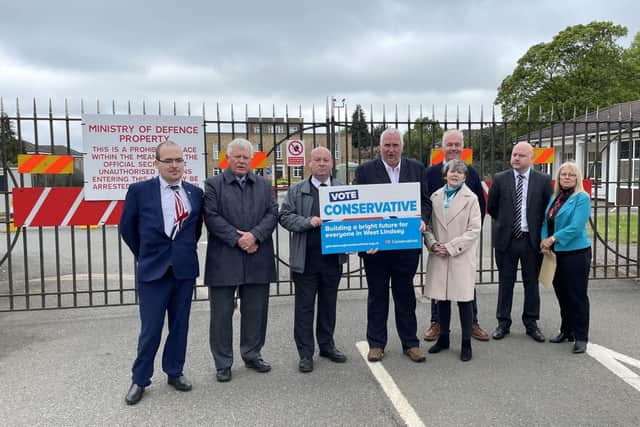 Conservative councillors outside the former RAF Scampton