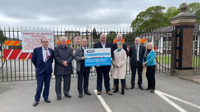 Conservative councillors outside the former RAF Scampton