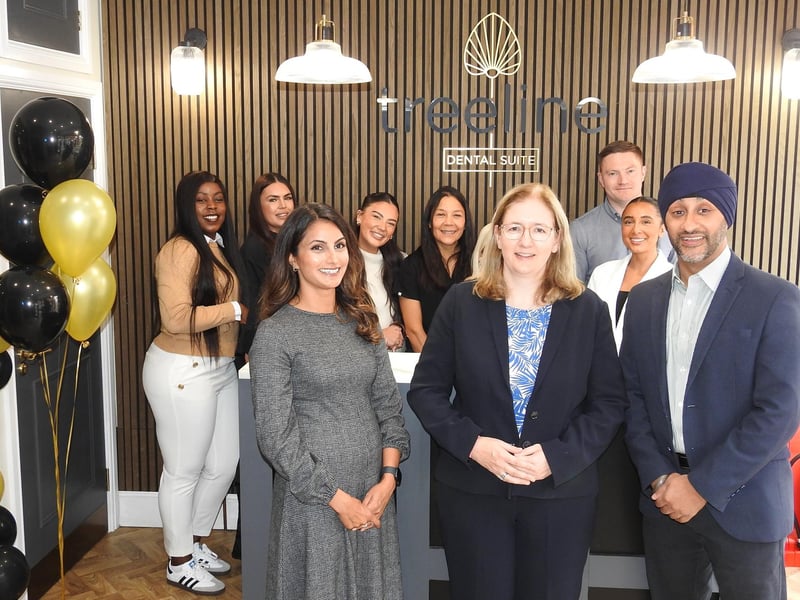 MP Dr Caroline Johnson with Treeline Dental directors Navjit Jandhu and Jimmy Palahey and staff at the new suite.