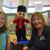 Kay Turnbull and Mel Fenwick with a woolly  visitor