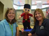 Kay Turnbull and Mel Fenwick with a woolly  visitor