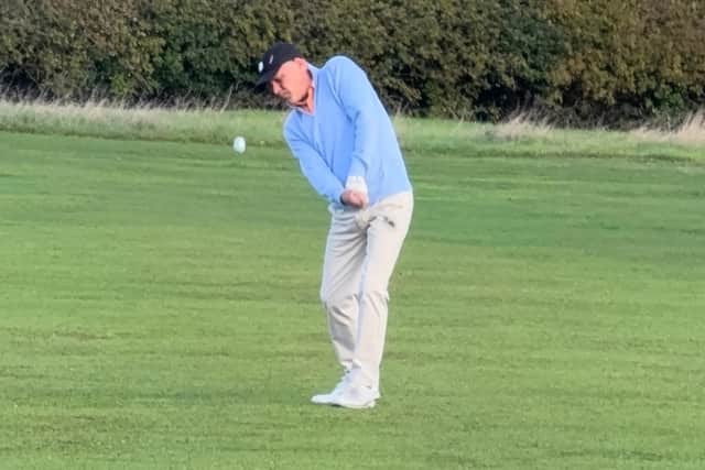 Another shot of David Tuscarny on the golf course.