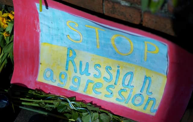 Flowers and messages of support left outside the Ukraine Embassy in Dublin. Tanaiste Leo Varadkar said ministers will look at how Ireland can help the people of Ukraine, both in its political and humanitarian response. Picture date: Thursday March 3, 2022.
