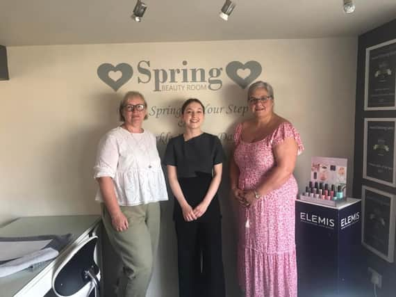 Caroline Draper (left) with therapist Elaina Hurren and one of those attending the event, Kay Wilkie