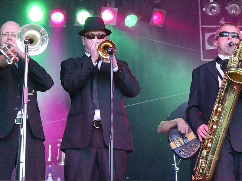 Bringing the brass, members of The Rumble Band.