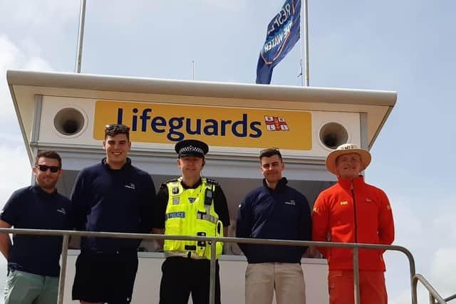 May - Working together are Brad Johnson, RNLI Lifeboat crew, Marcus Upjohn, RNLI Lifeguard Supervisor Chief Ins Lee St Quinton, Arun Gray, RNLI Lifeguard Supervisor, and Henry Houlden, RNLI Lifeguard