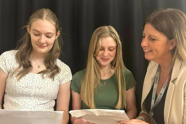 Charlotte Donnelly, Ruby Morley, and Head of School Katie Belcher.
