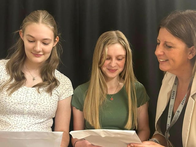 Charlotte Donnelly, Ruby Morley, and Head of School Katie Belcher.